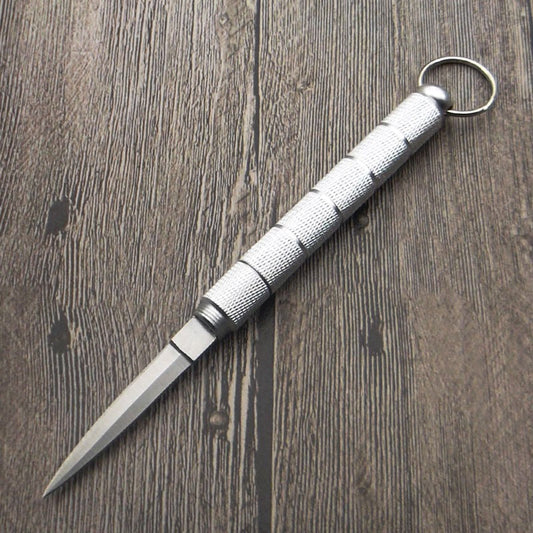 EZÜST SZÍNŰ KÉS KUPAKKAL